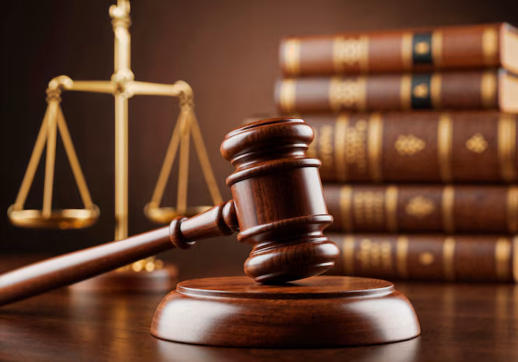 gavel-scales-justice-law-books_23-2151998158